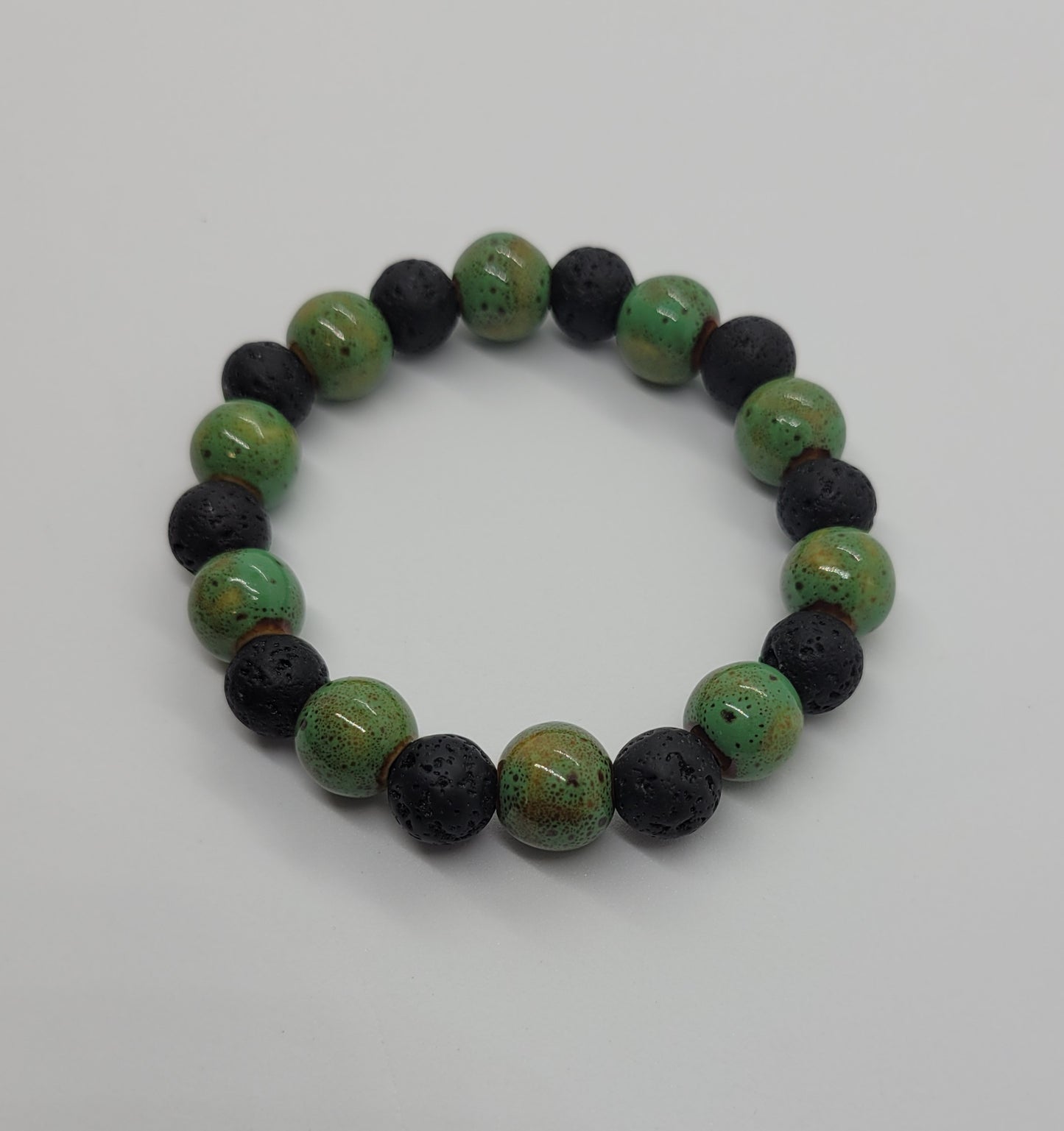 Green black lava money beaded bracelet